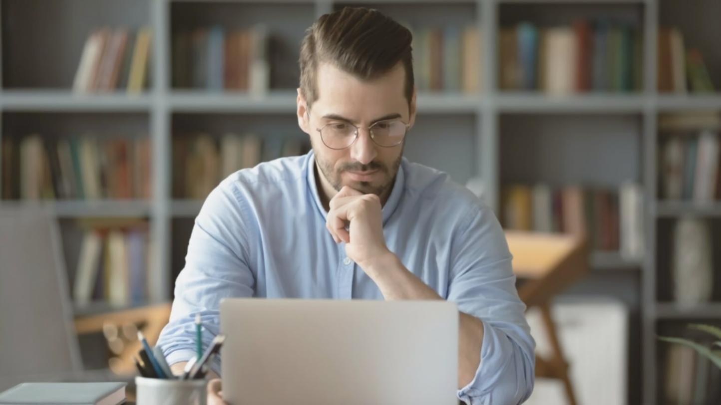 Instructor working through a monthly budget plan with a student in an online session